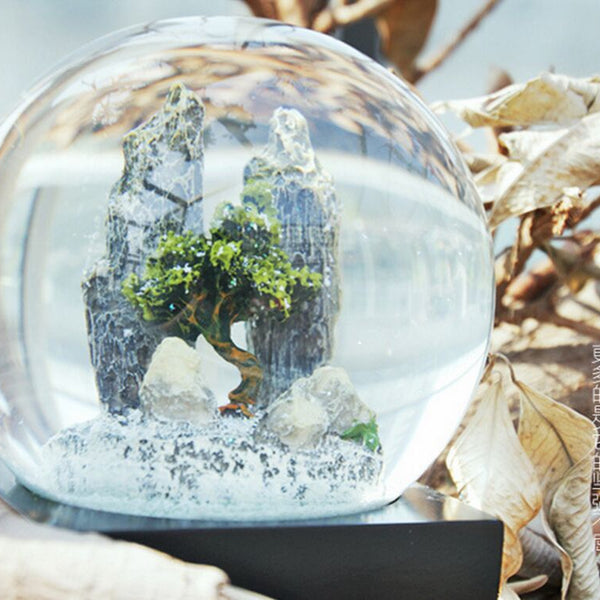 Stone Snow Globe